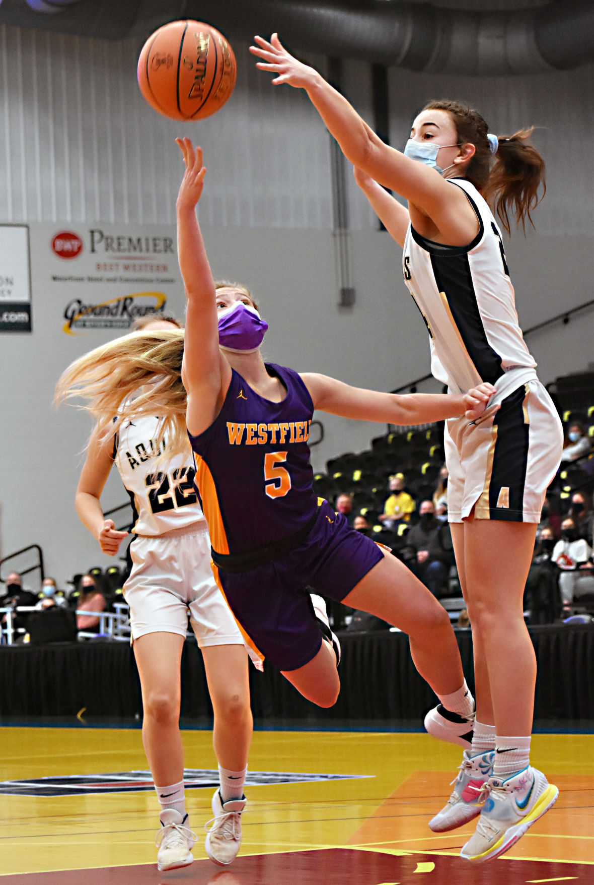 Jacy Weisbrod tries to block a shot